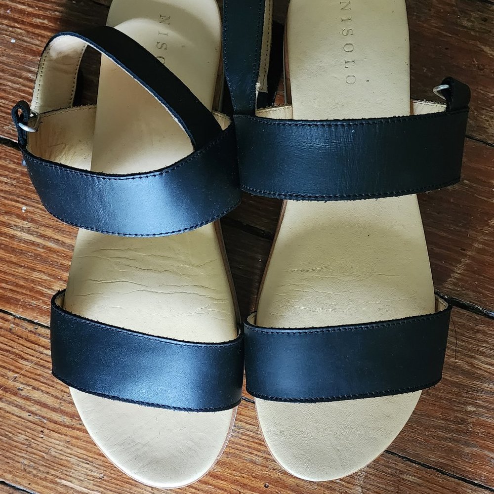 Sending to consignment tomorrow-Nisolo Black and Tan Sandals